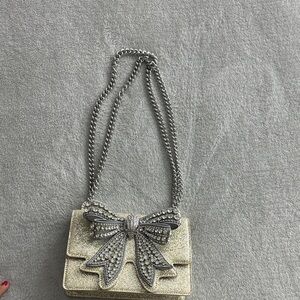 Kurt Geiger Silver Glitter Bow Clutch